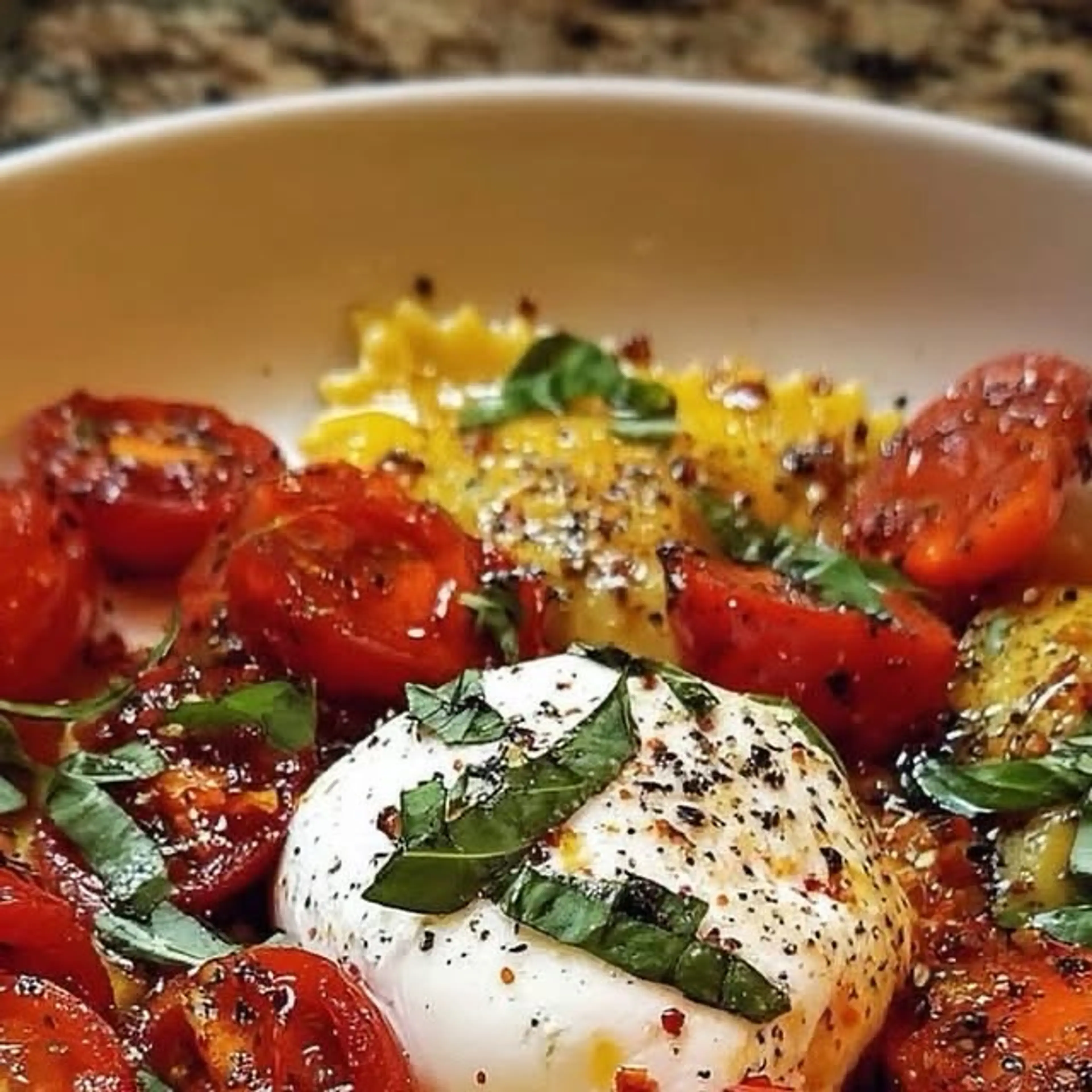 Ravioli with Roasted Cherry Tomatoes, Burrata & Basil