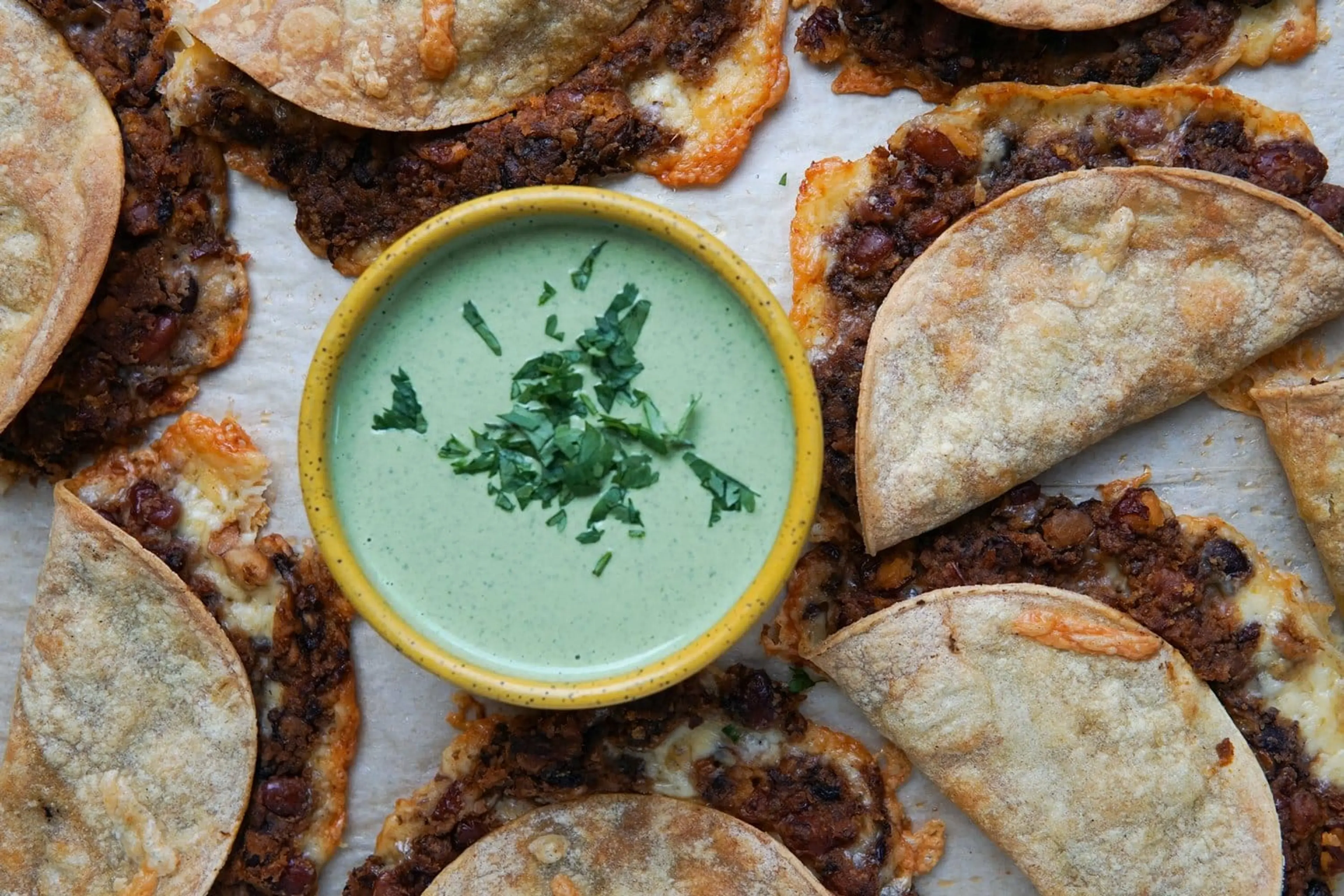 Crispy Oven Tacos with Cilantro Jalapeno Sauce