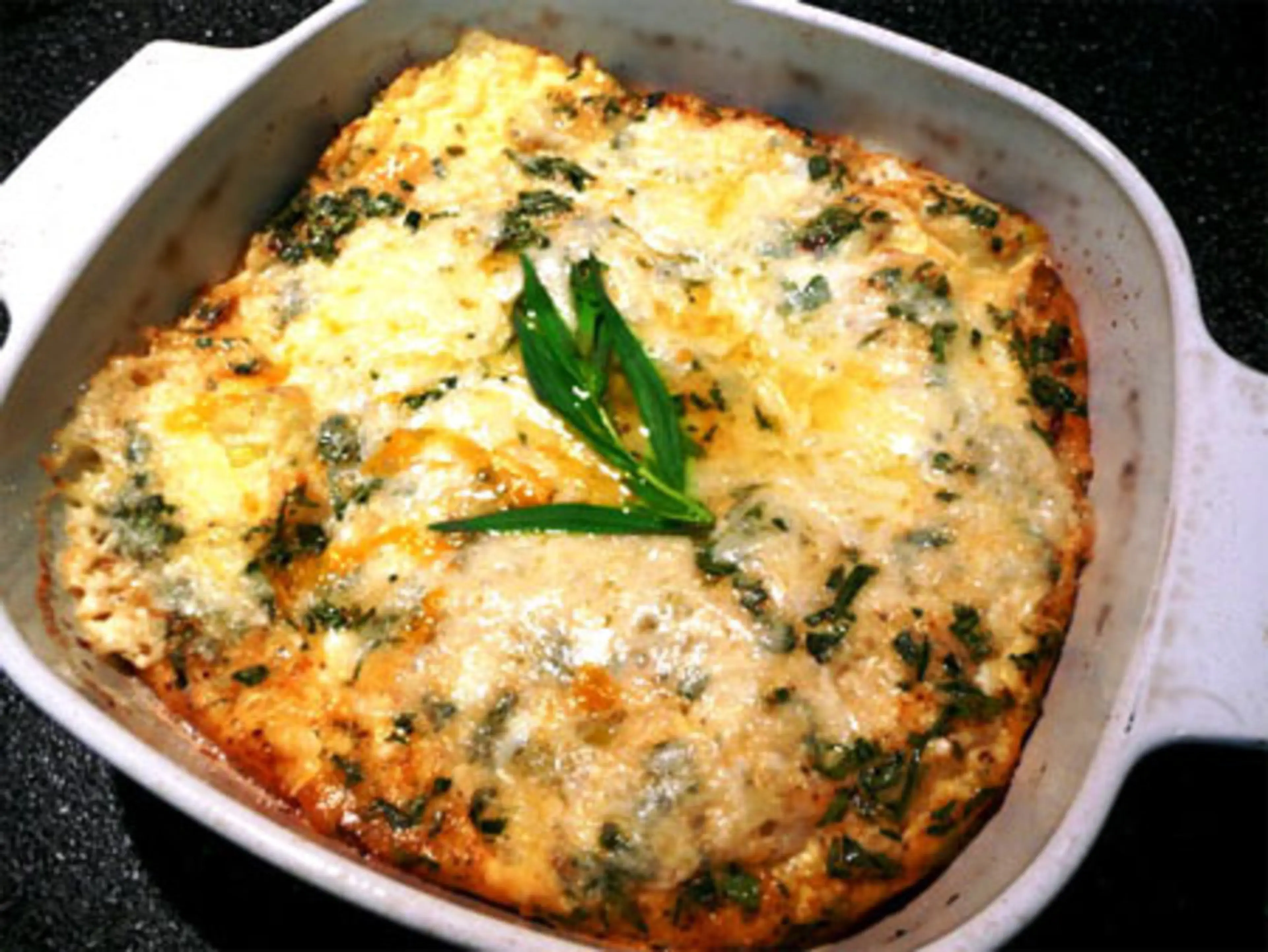 Baked Cheesy Eggs With Leeks and Tarragon