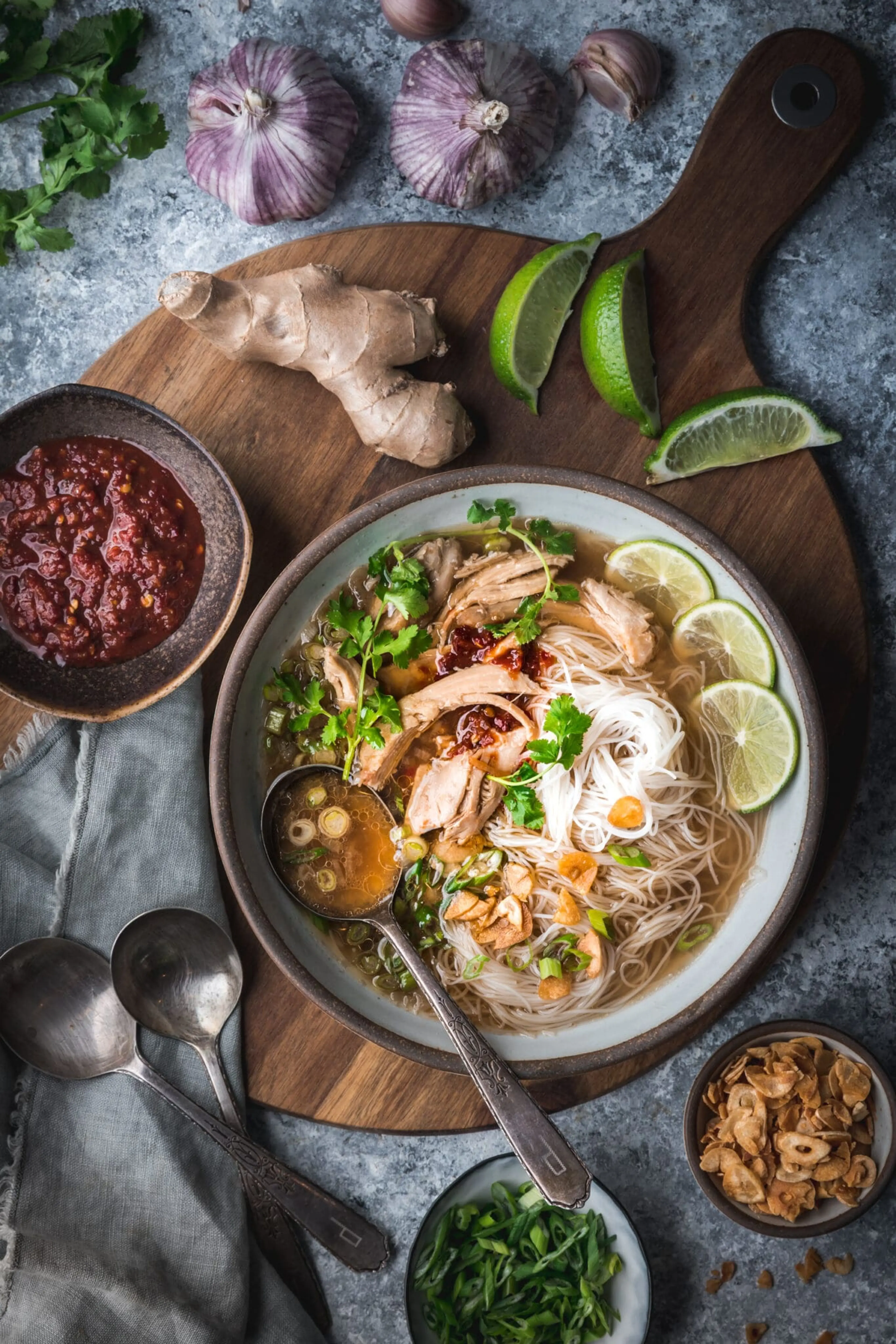 Gingery Chicken and Rice Noodle Soup with Crispy Garlic