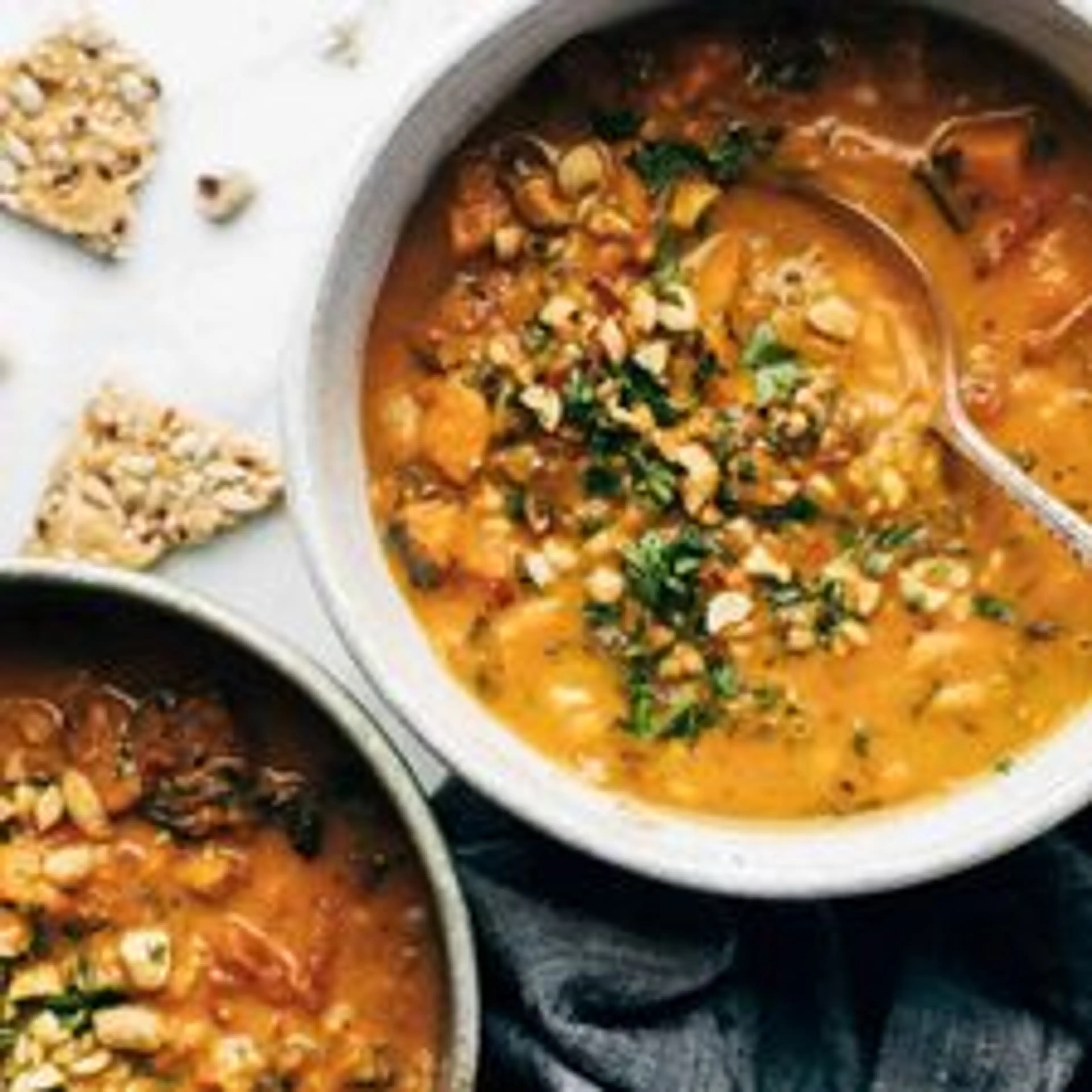 Spicy Peanut Soup with Sweet Potato + Kale