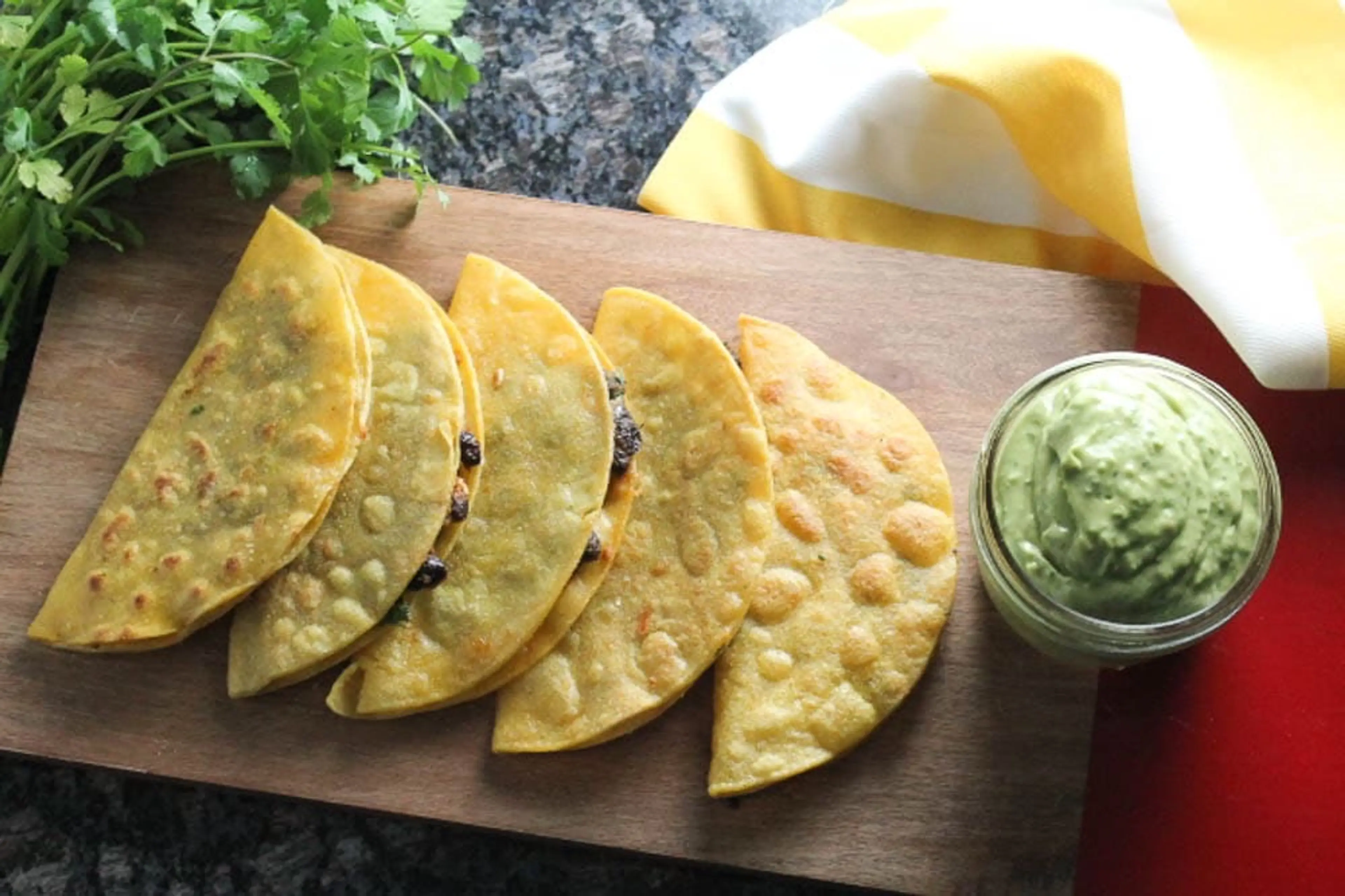 Crispy Black Bean Tacos with Avocado-Lime Sauce