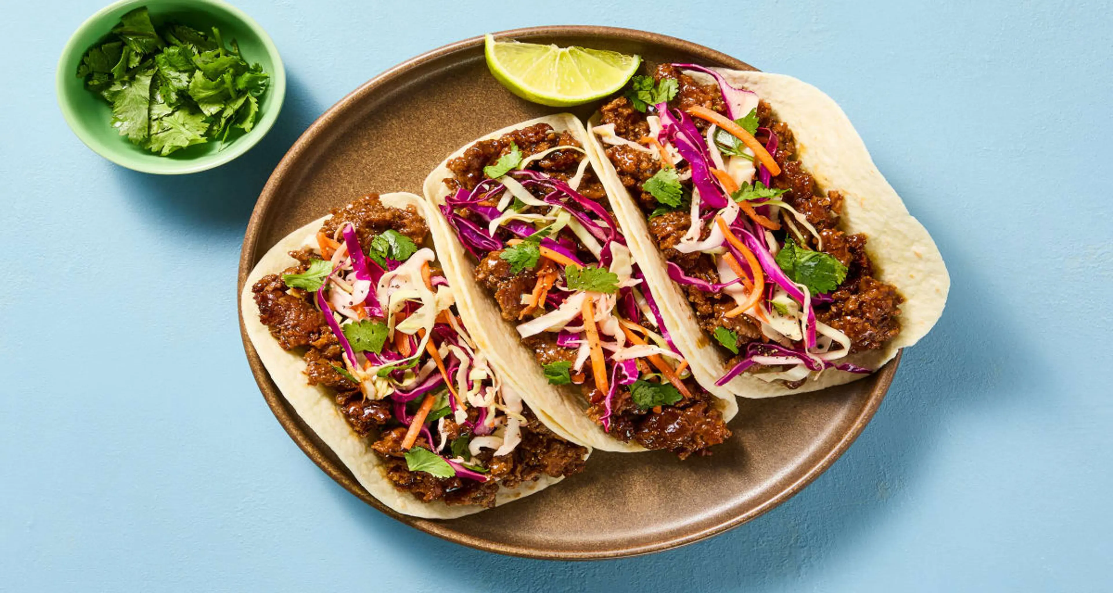 Bulgogi Beef Tacos with Lime-Ponzu Slaw & Cilantro