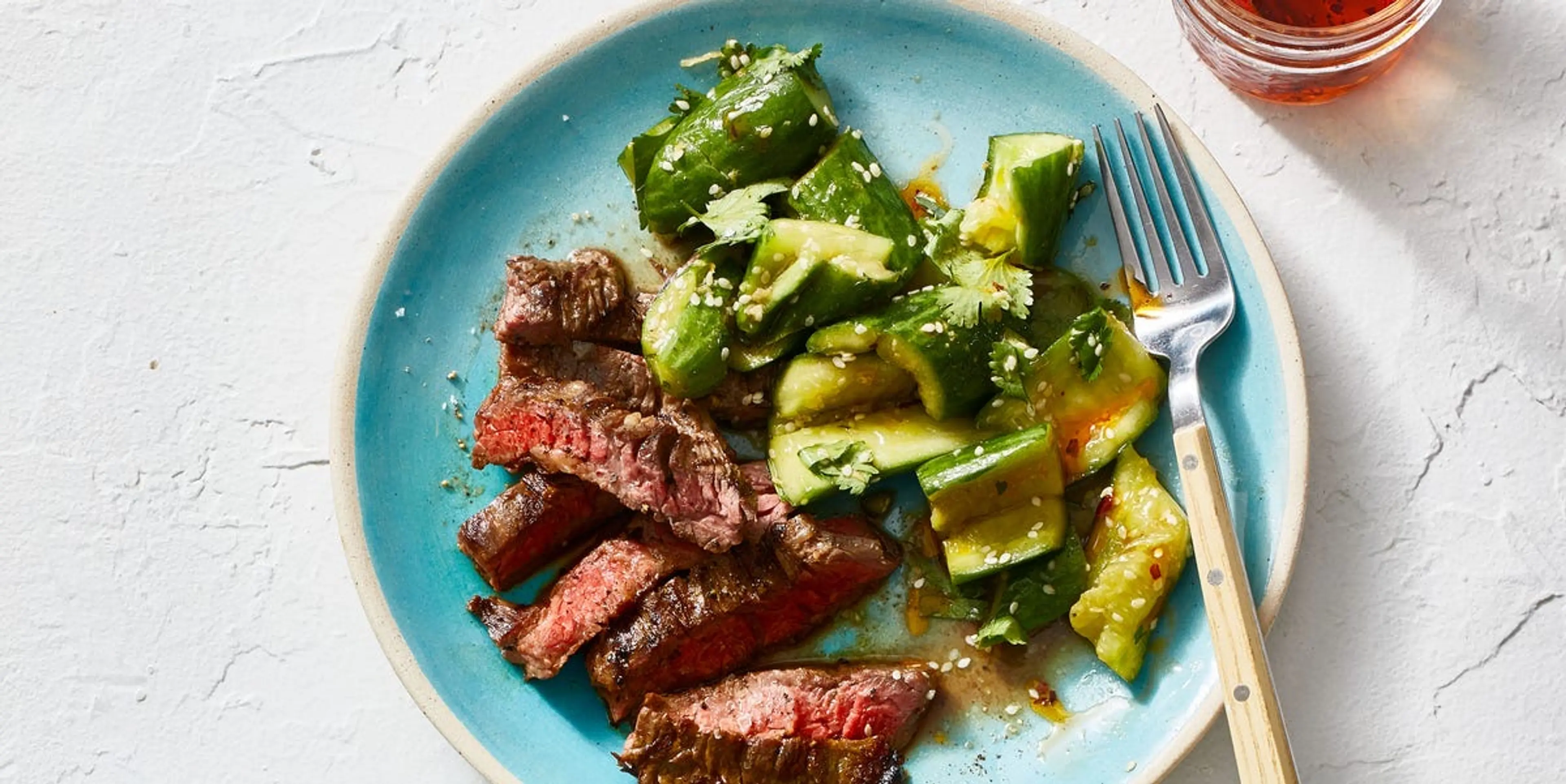 Steak with Smashed Cucumber Salad