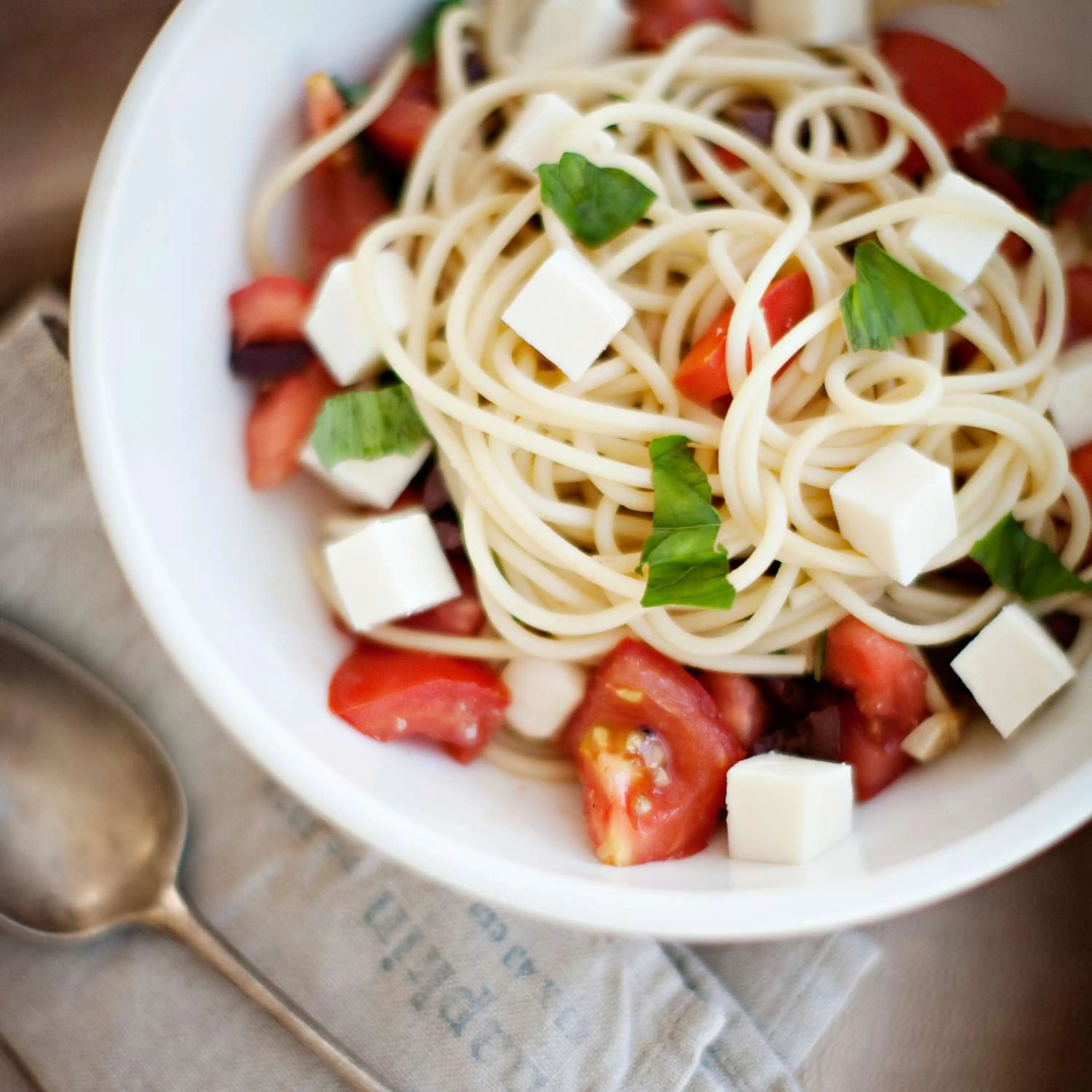 Spaghetti with Tomatoes, Basil, Olives, and Fresh Mozzarella
