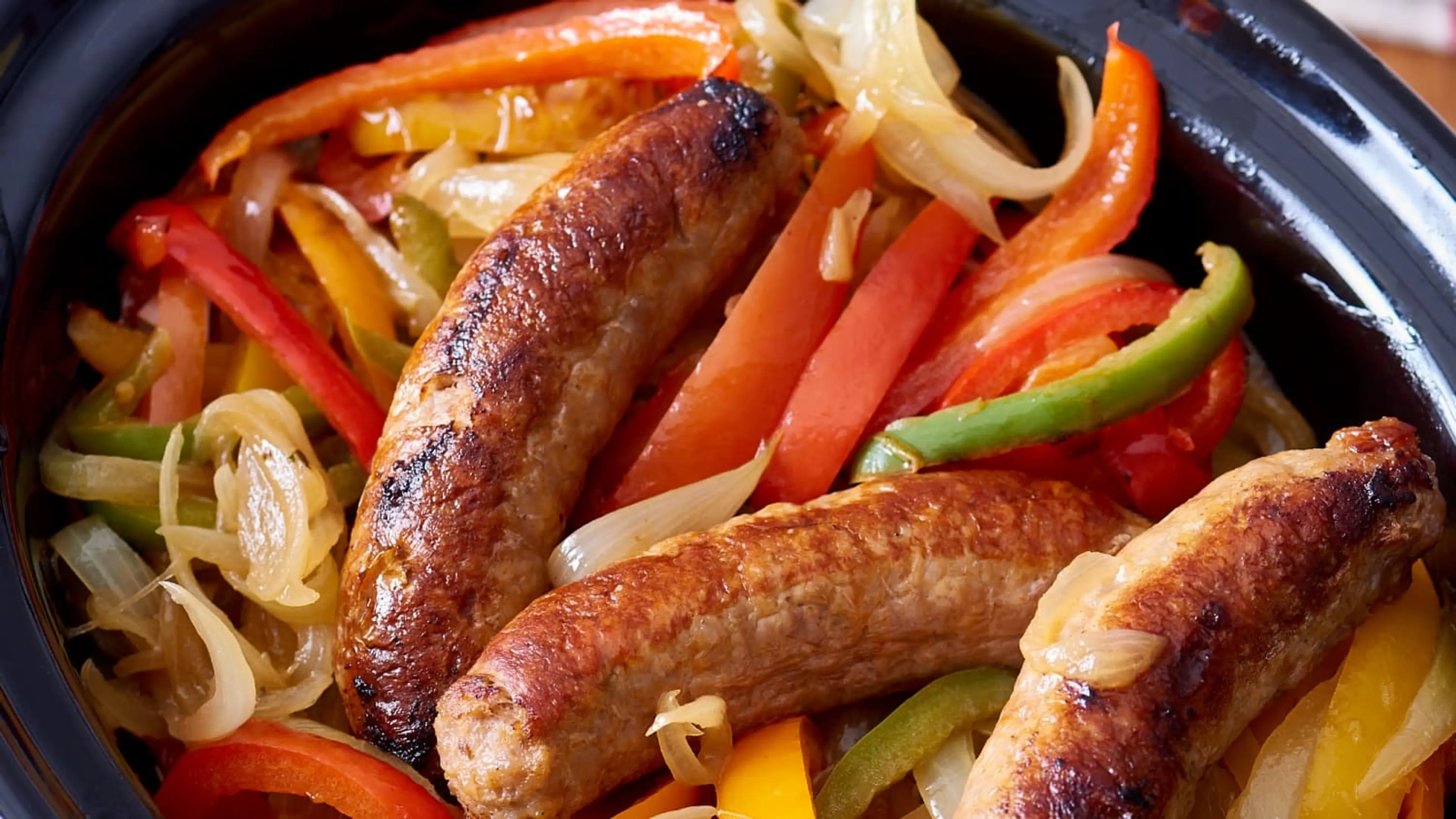 Slow Cooker Sausages with Peppers and Onions