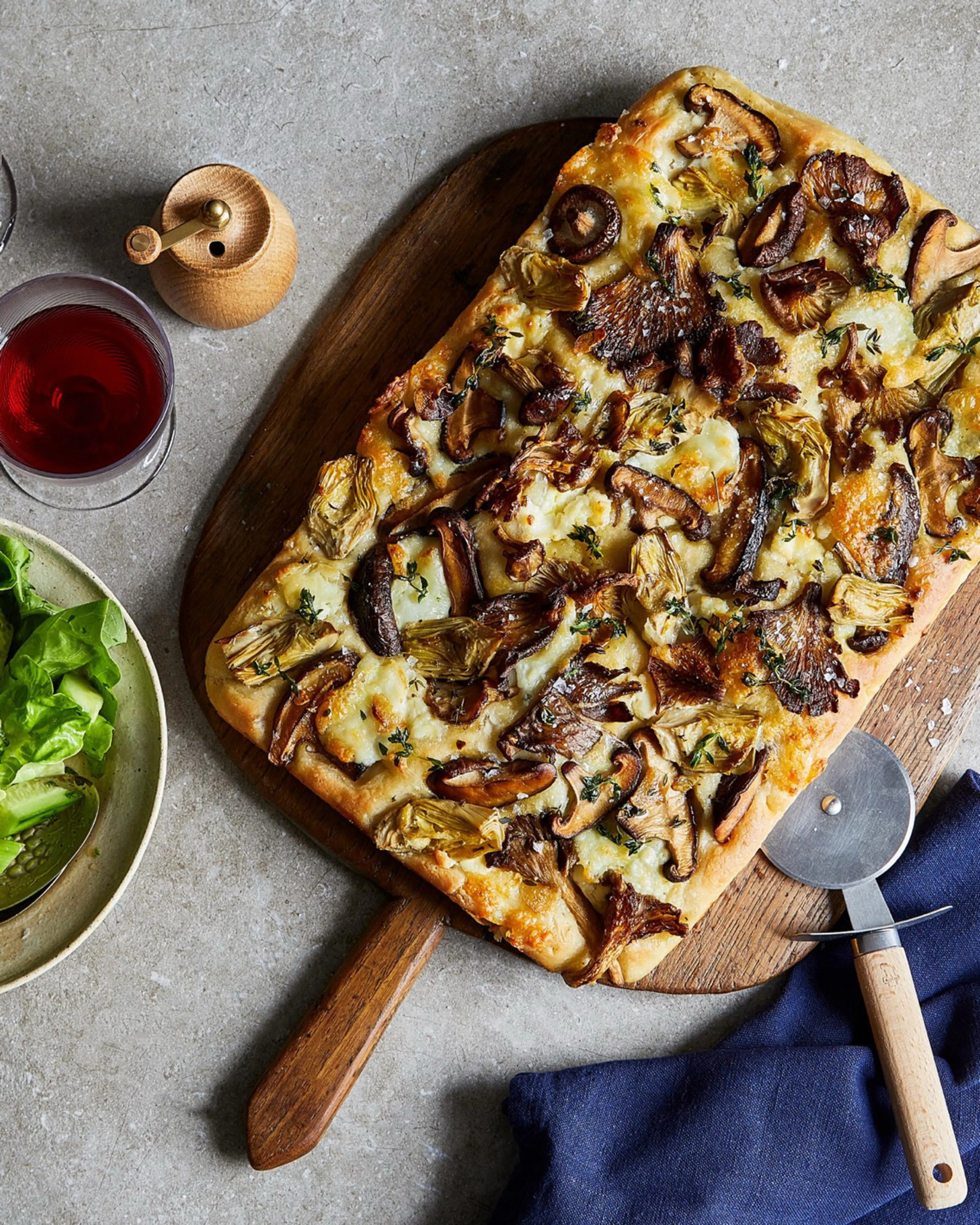 Tray-baked garlic mushroom, mascarpone and artichoke pizza