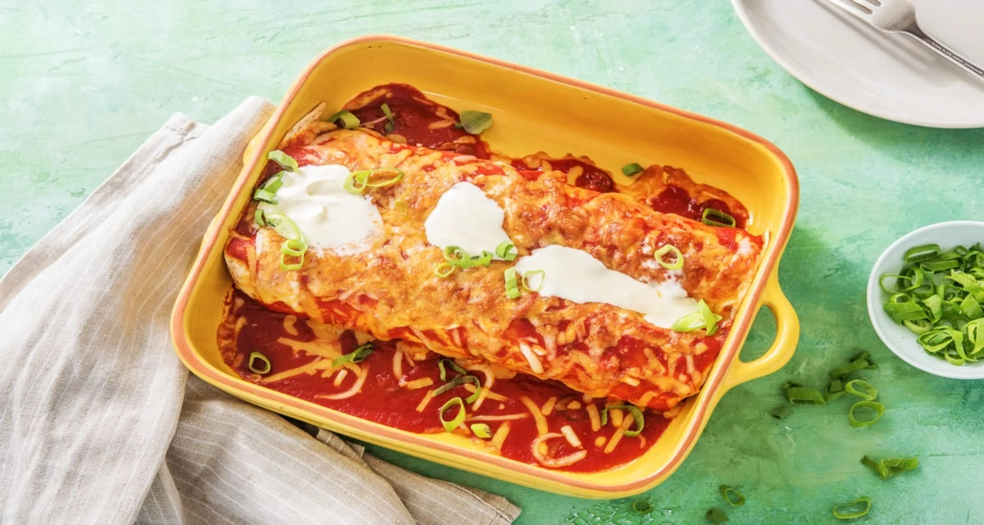 Smothered Chicken Enchiladas with Poblano Pepper, Onion, and