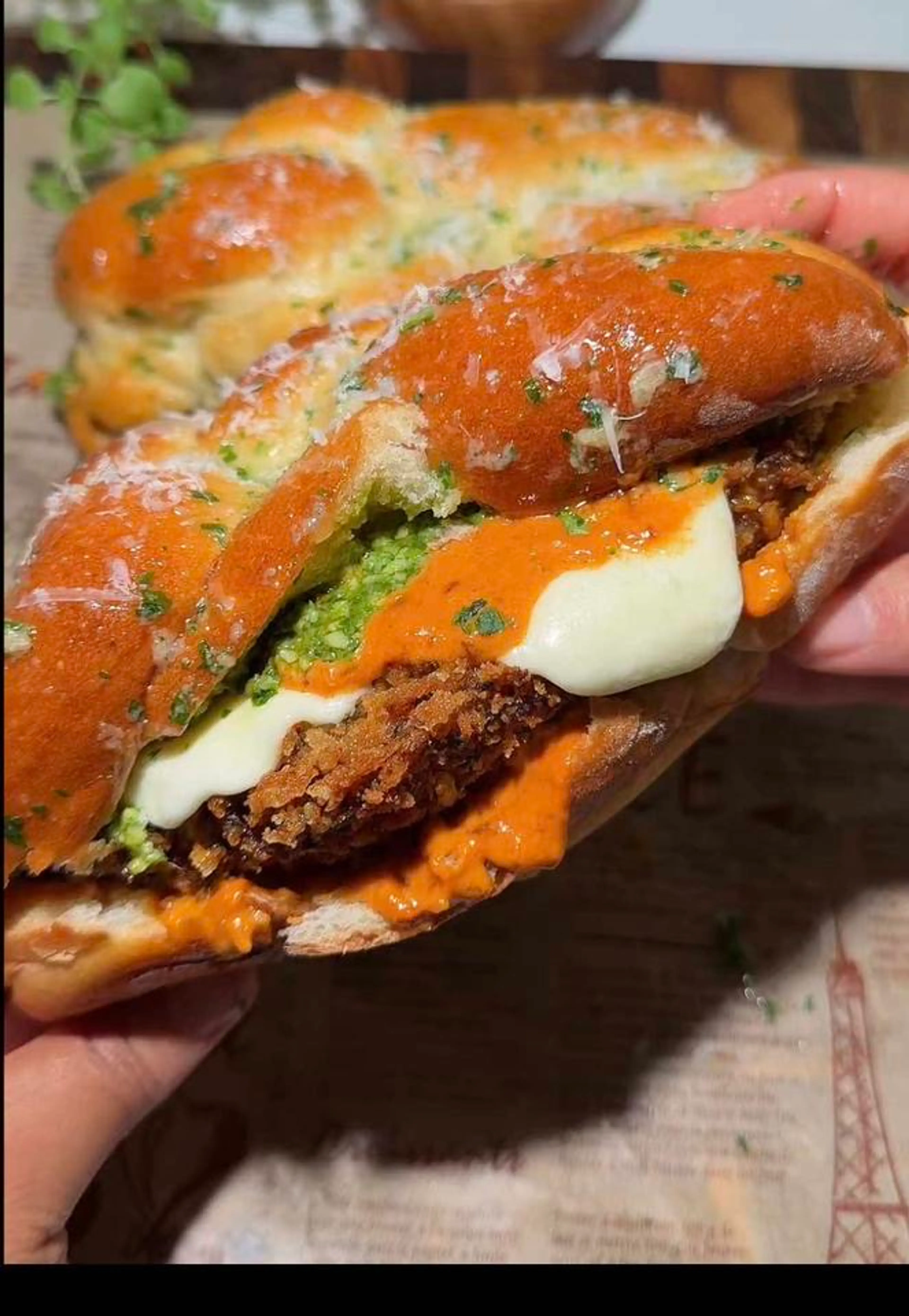 Vodka Chicken Parmesan Sandwich on a Garlic Knot Sandwich Ro