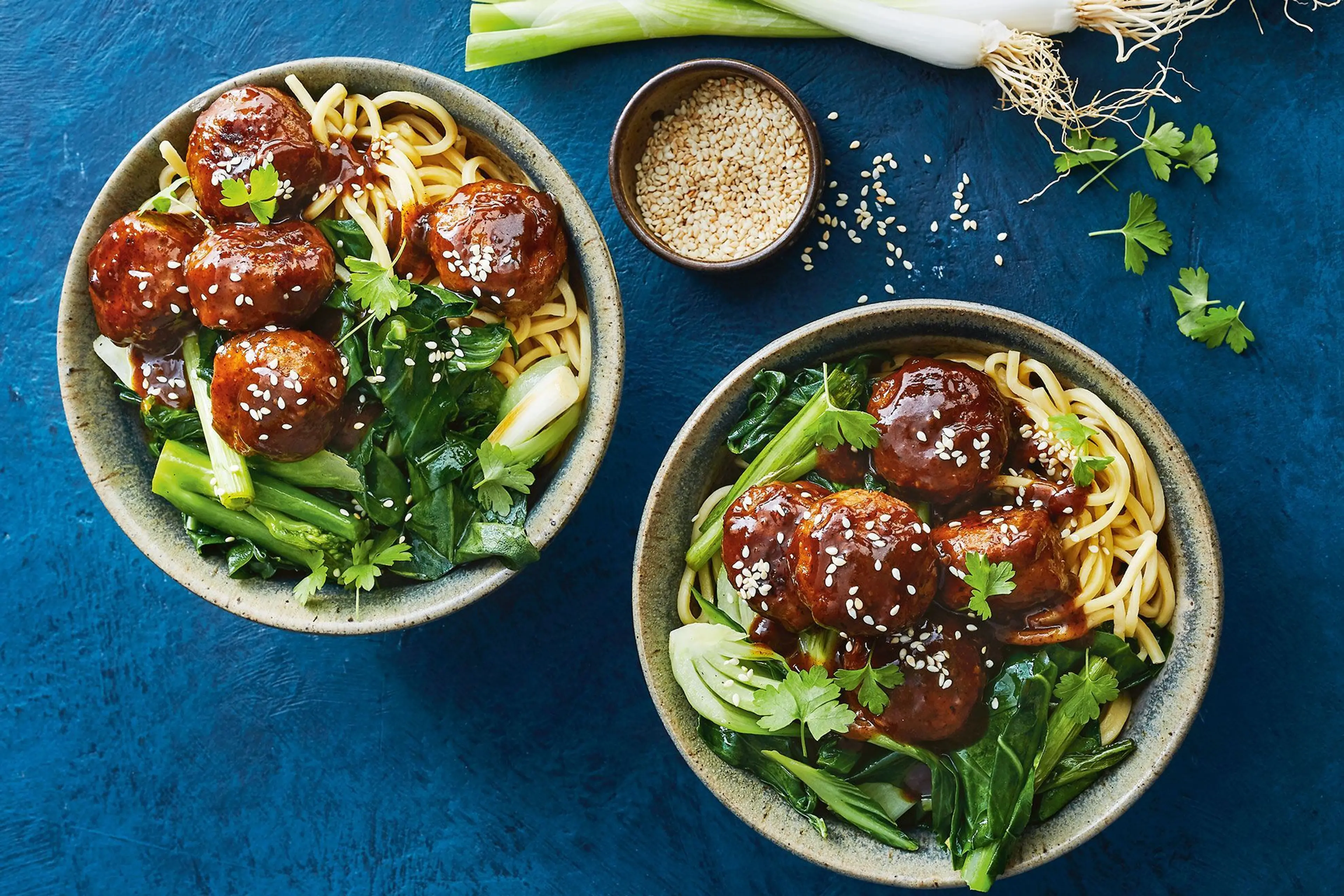 Sticky barbecue meatballs with Asian greens recipe