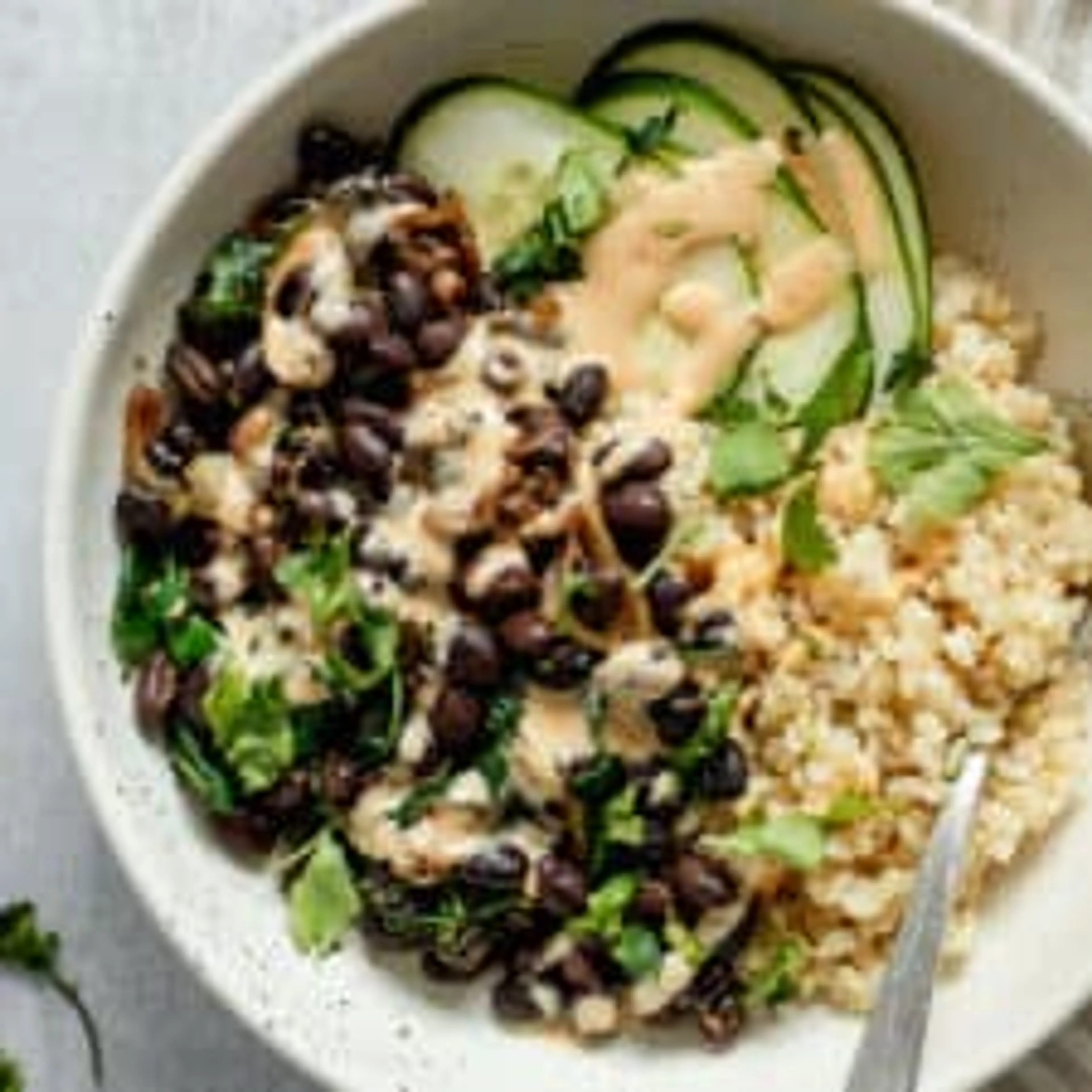 Black Bean Nourish Bowl with Creamy Ginger Sriracha Dressing