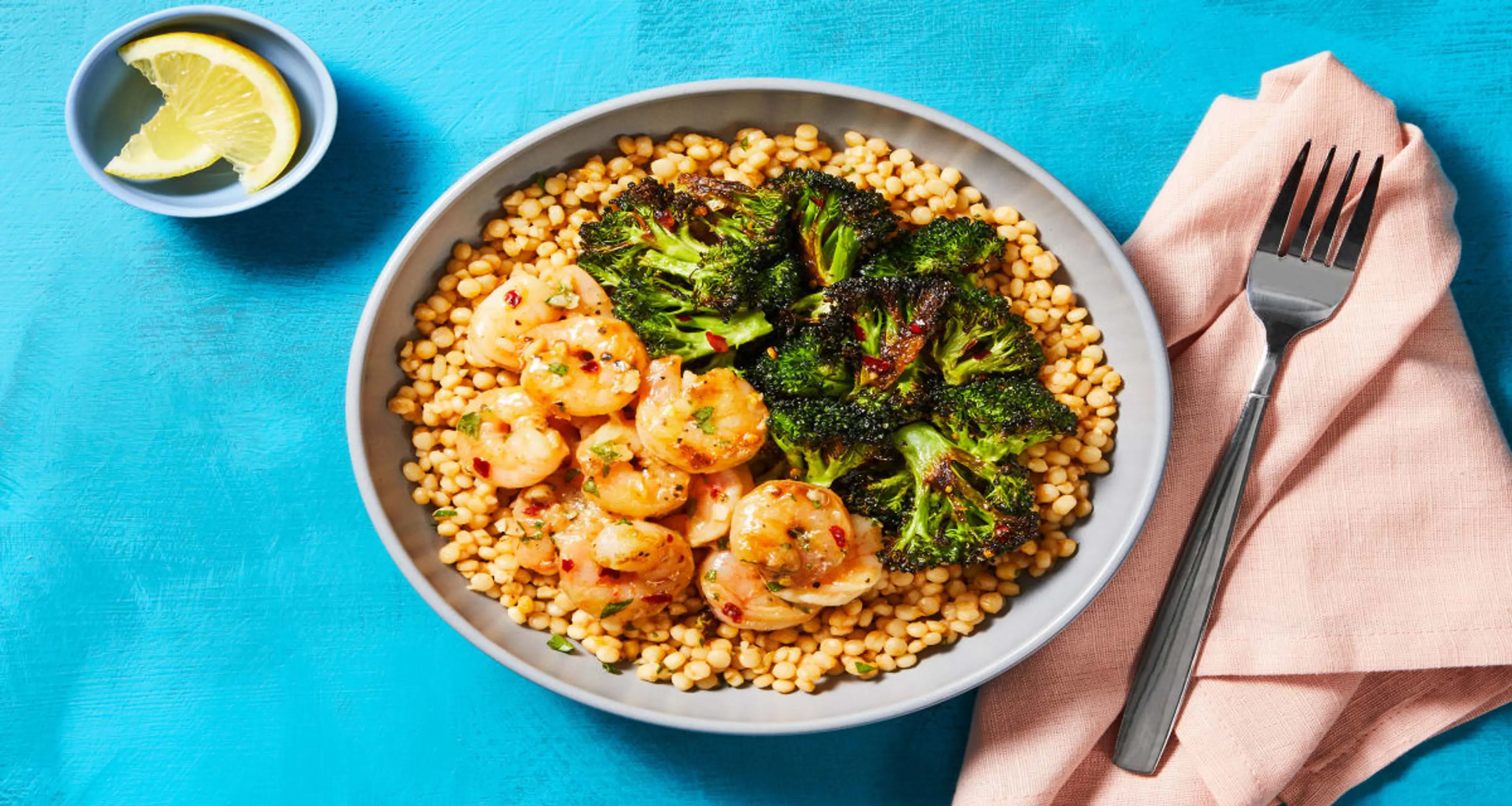 Garlicky Shrimp Couscous Bowls with Chili-Roasted Broccoli &