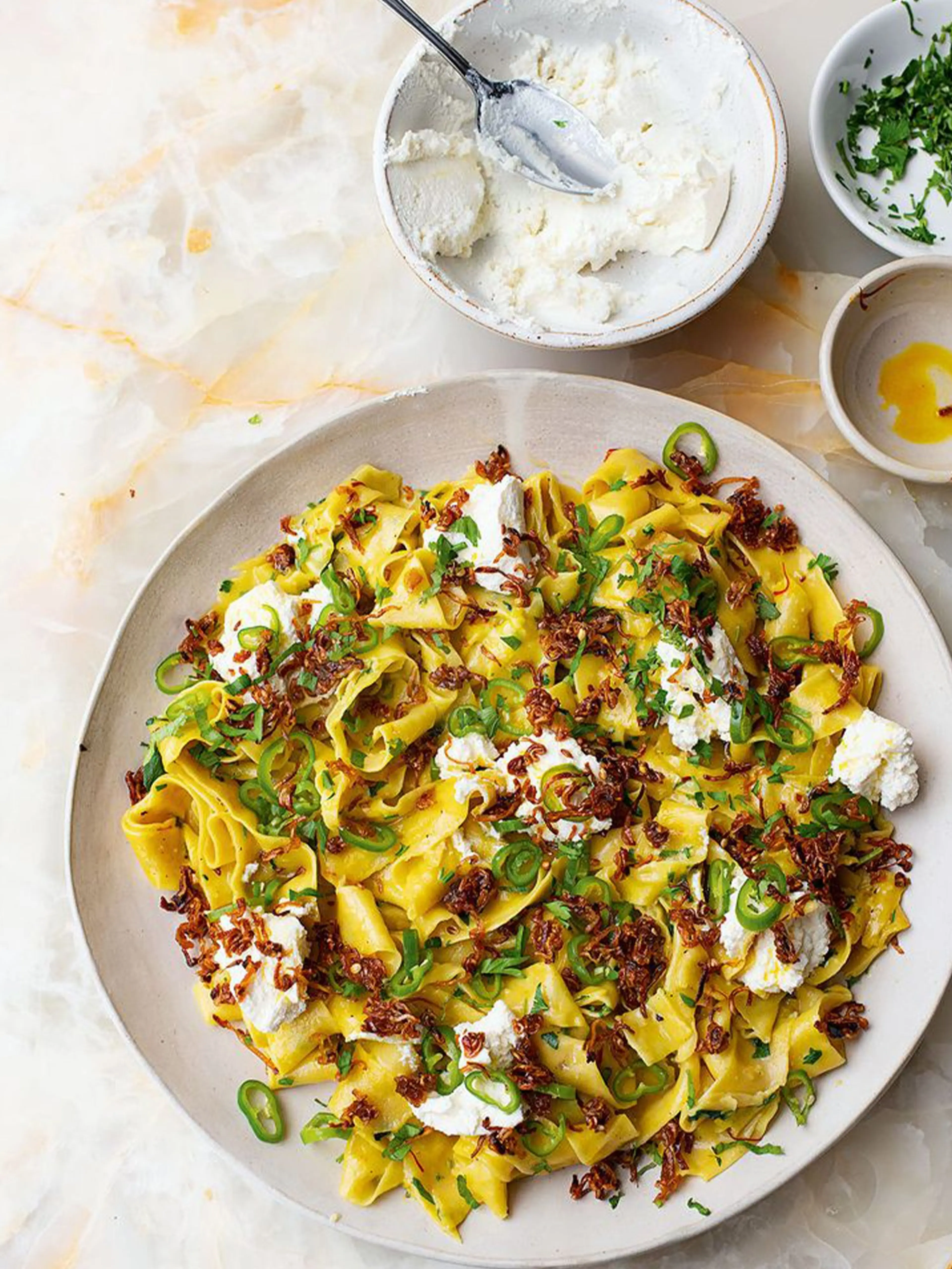 Saffron pasta with chipotle shallots and pickled chillies
