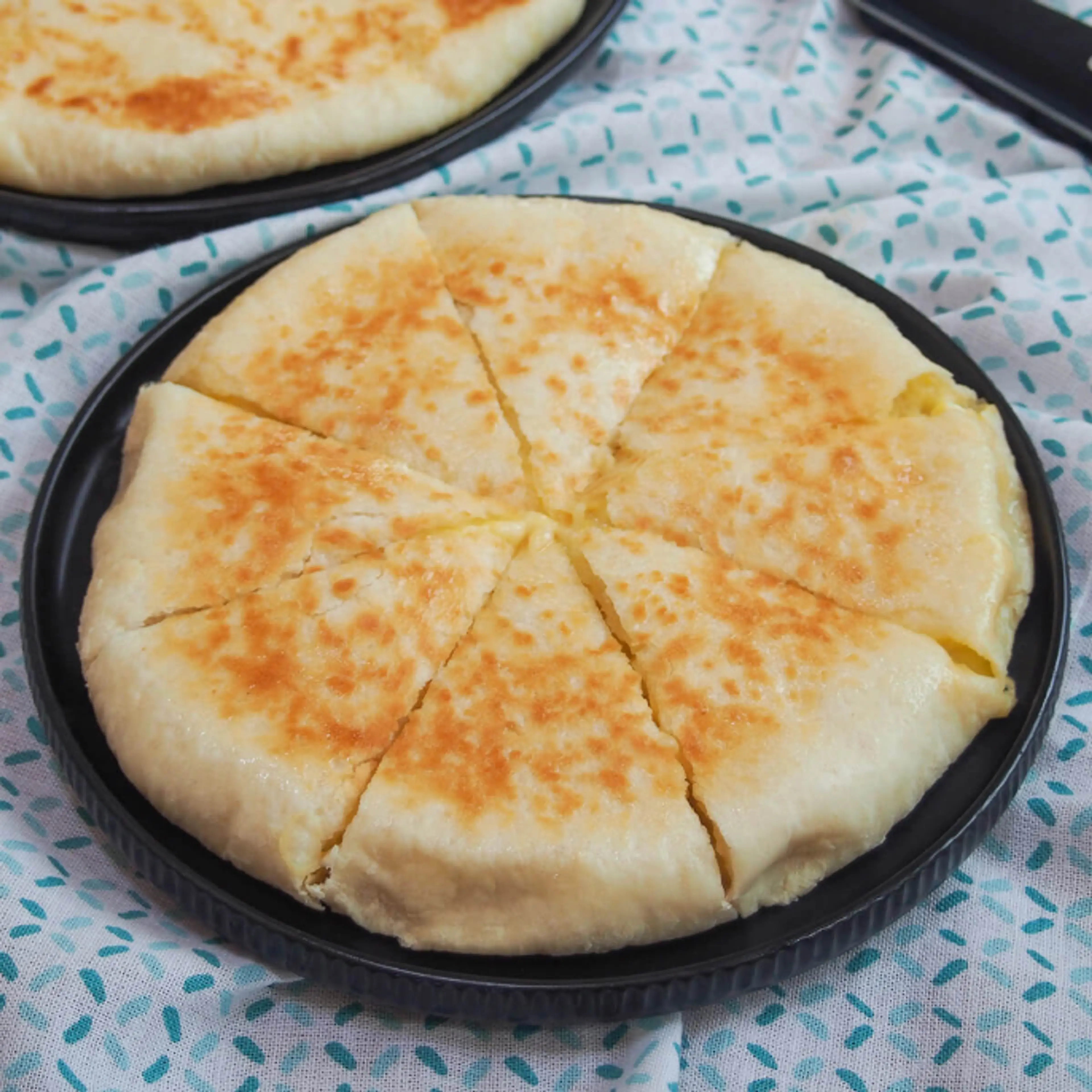 Imeruli khachapuri (Georgian cheese filled bread)