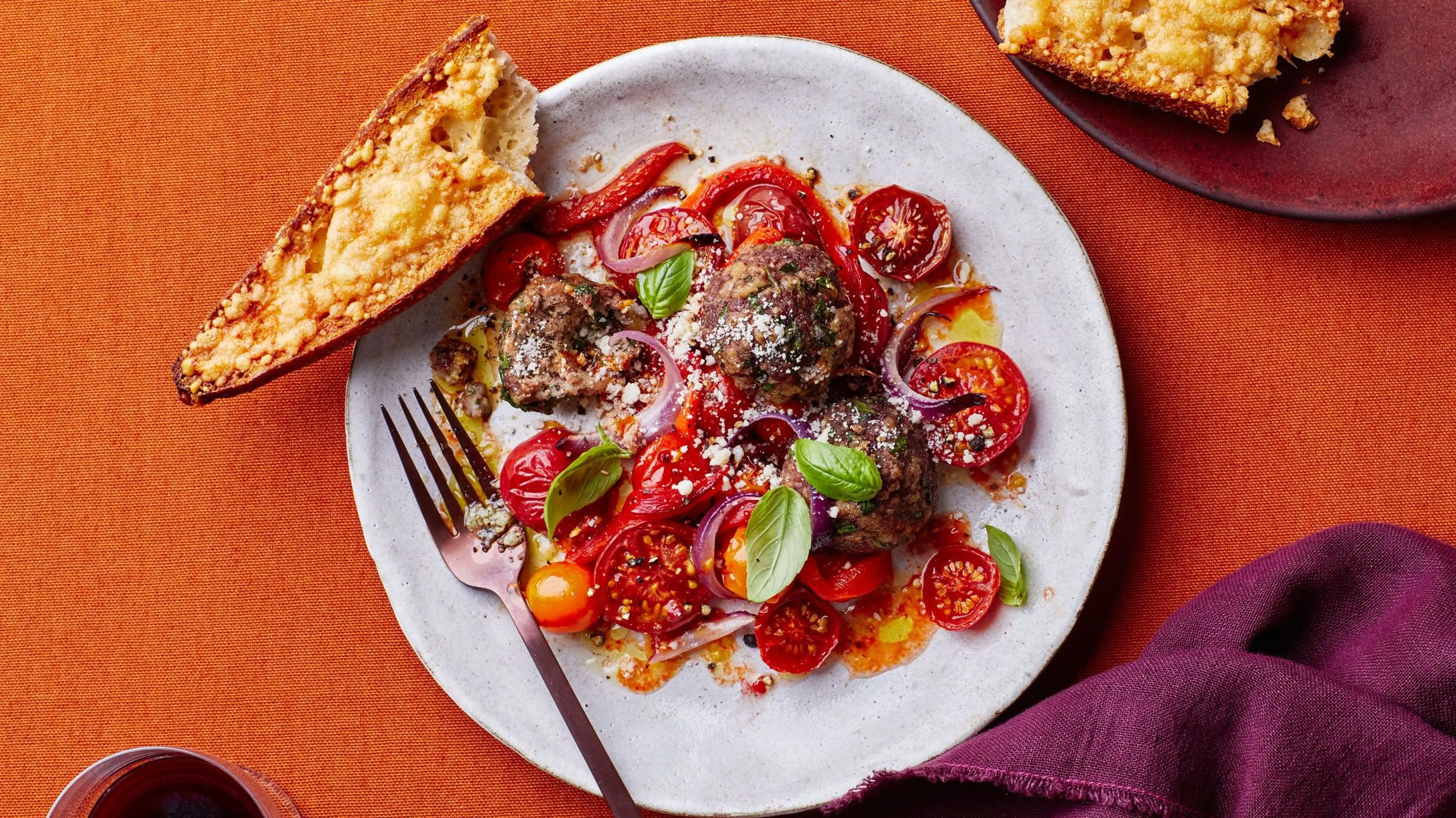 Sheet-Pan Meatballs With Burst Tomatoes and Parmesan Toast