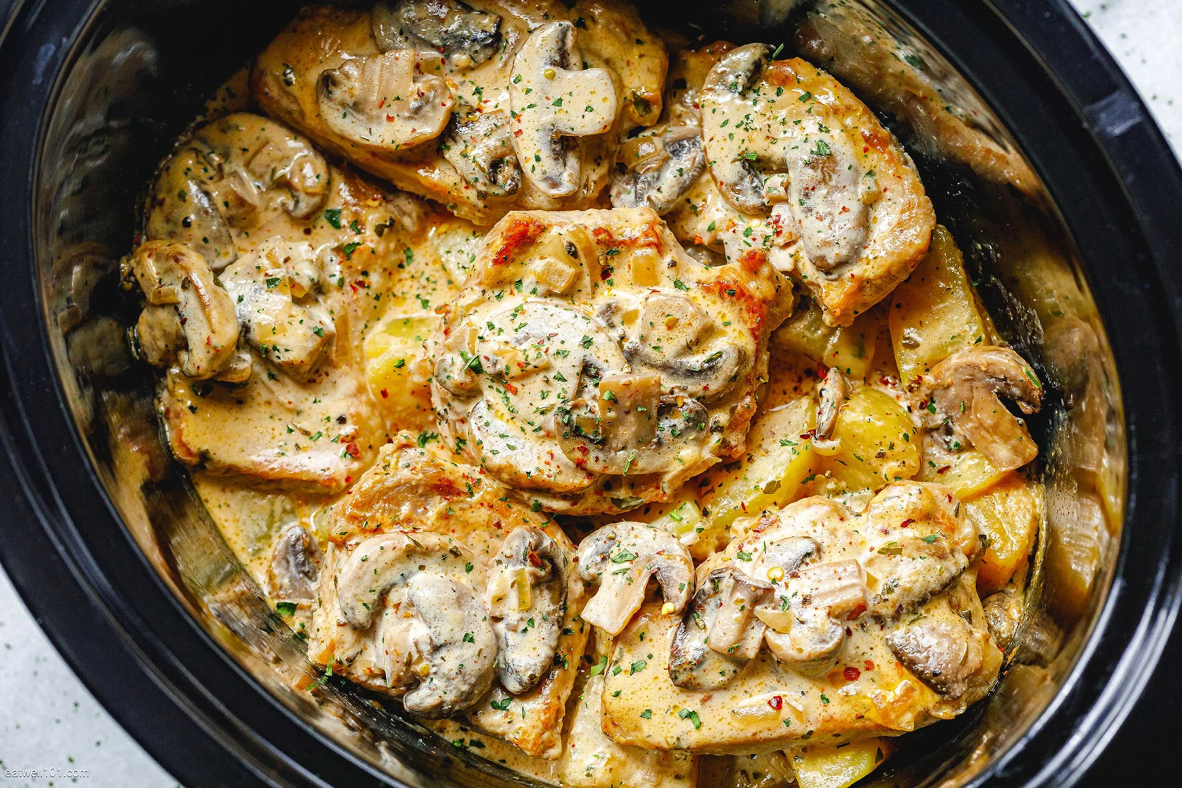 Crockpot Creamy Garlic Pork Chops Potatoes