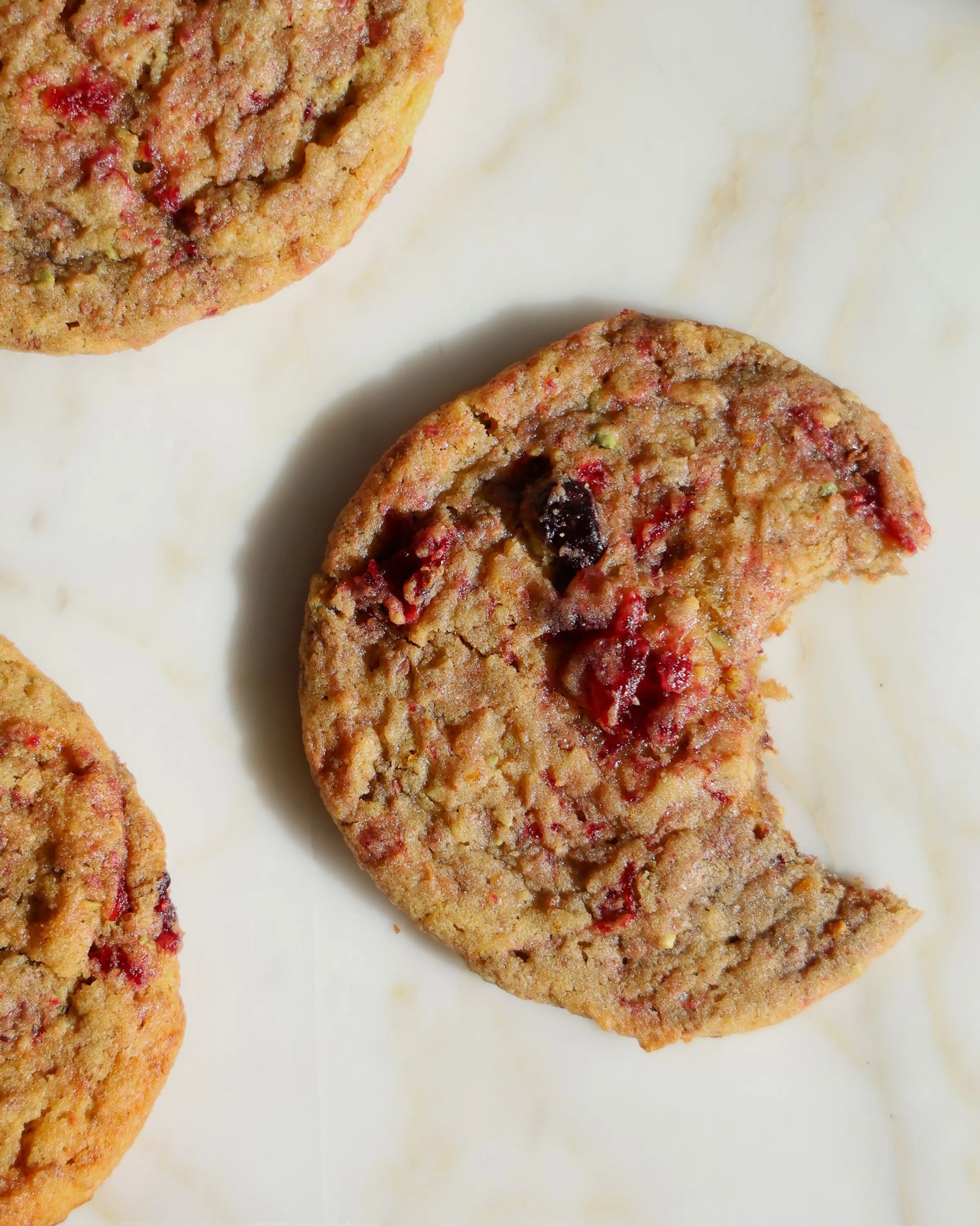 Honeynut Cookies with Pistachio Chocolate and Cranberry Swir