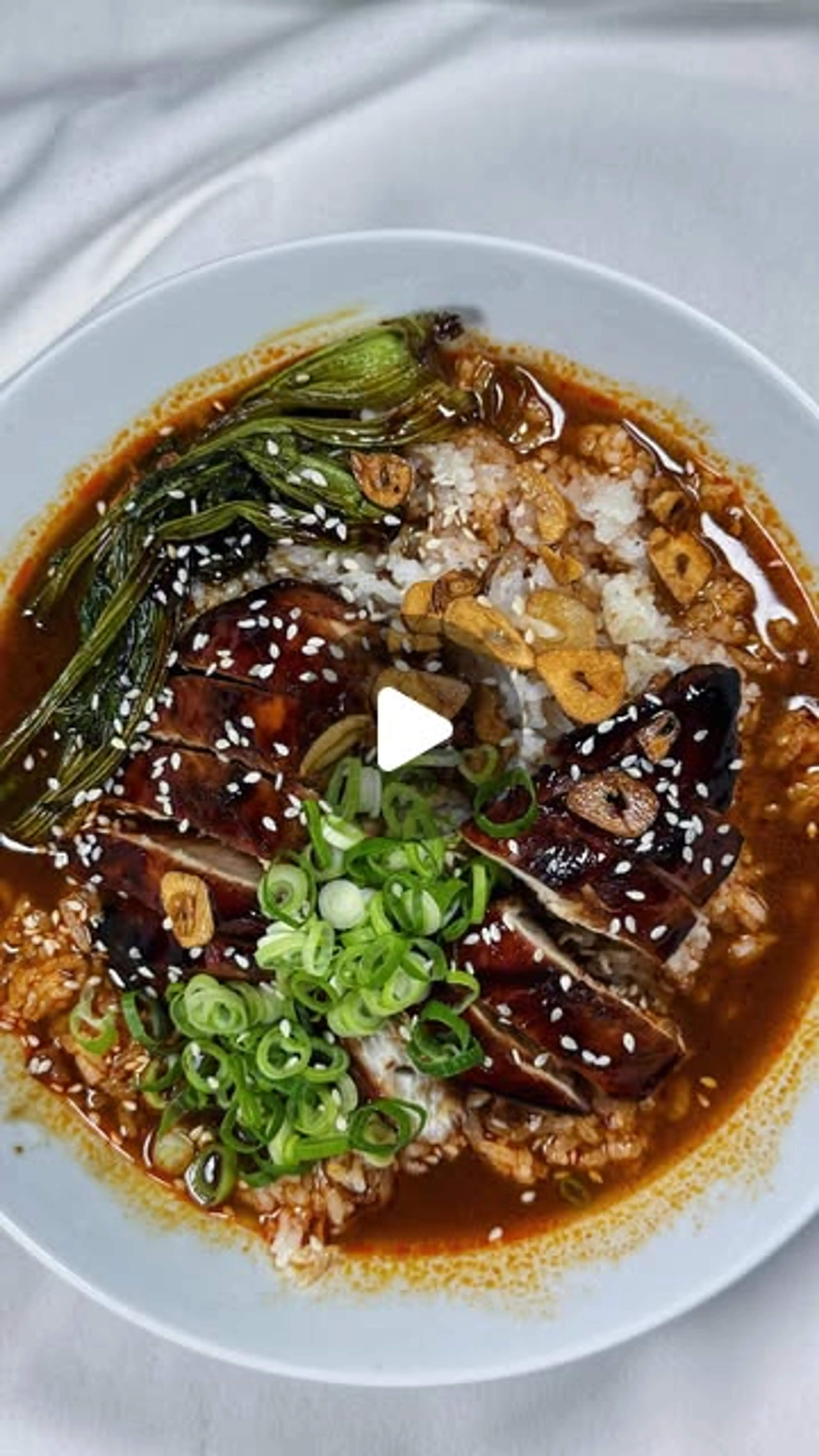 Sticky Soy Chicken with Garlic Rice in a Spicy Broth