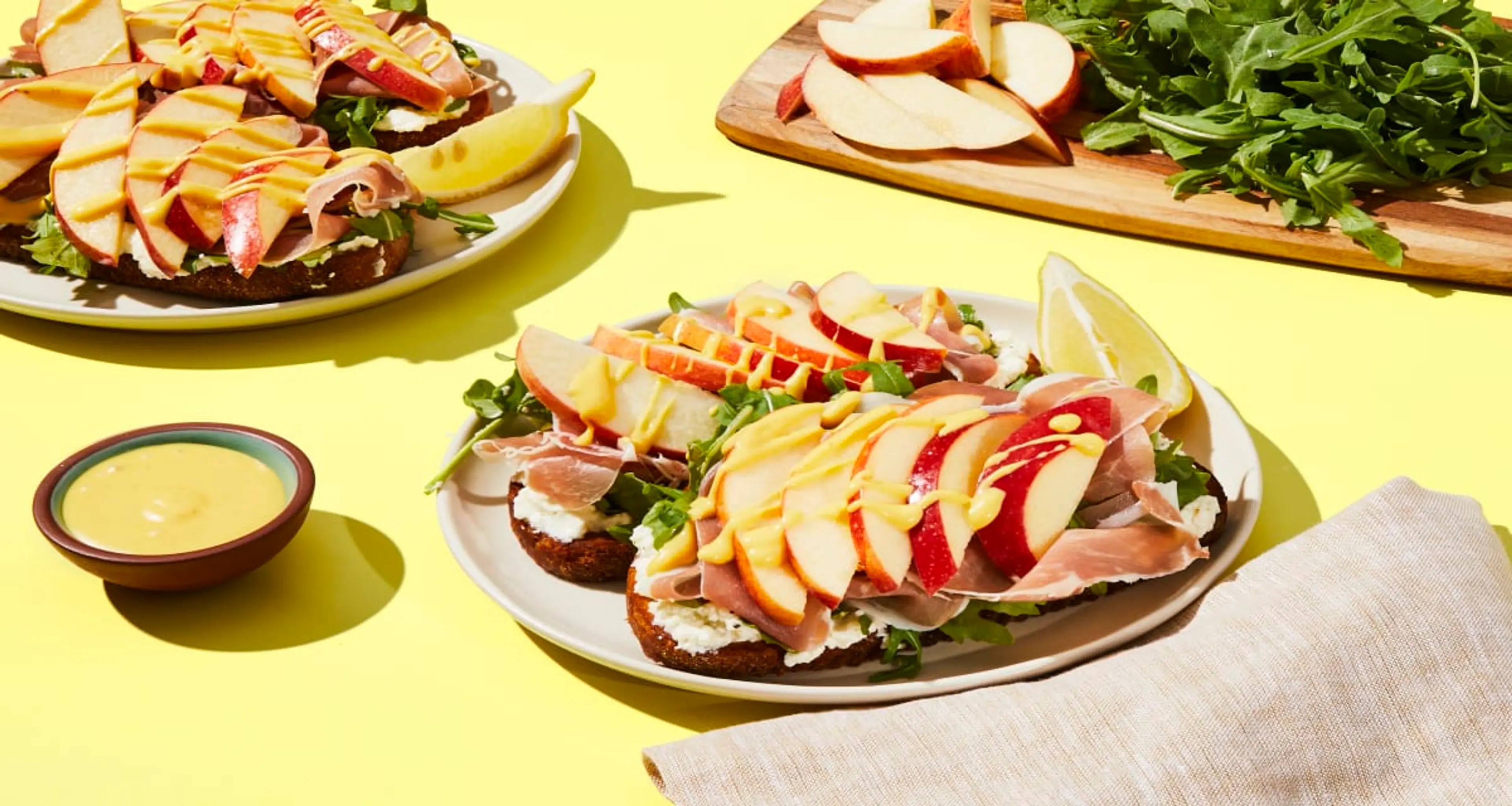 Prosciutto, Ricotta & Apple Toasts with Arugula & Honey Dijo