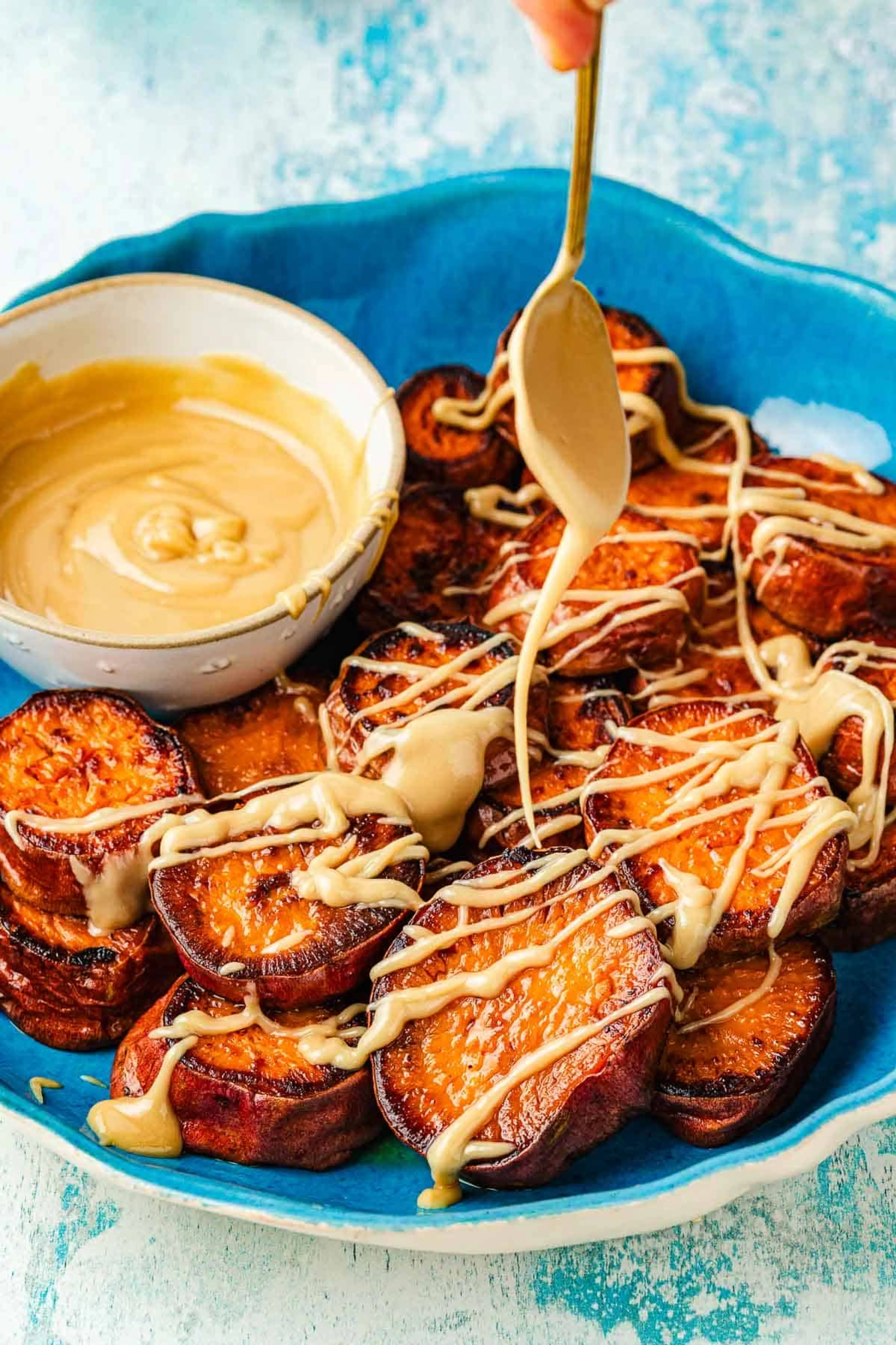 Oven Roasted Sweet Potatoes with a Honeyed Tahini Drizzle