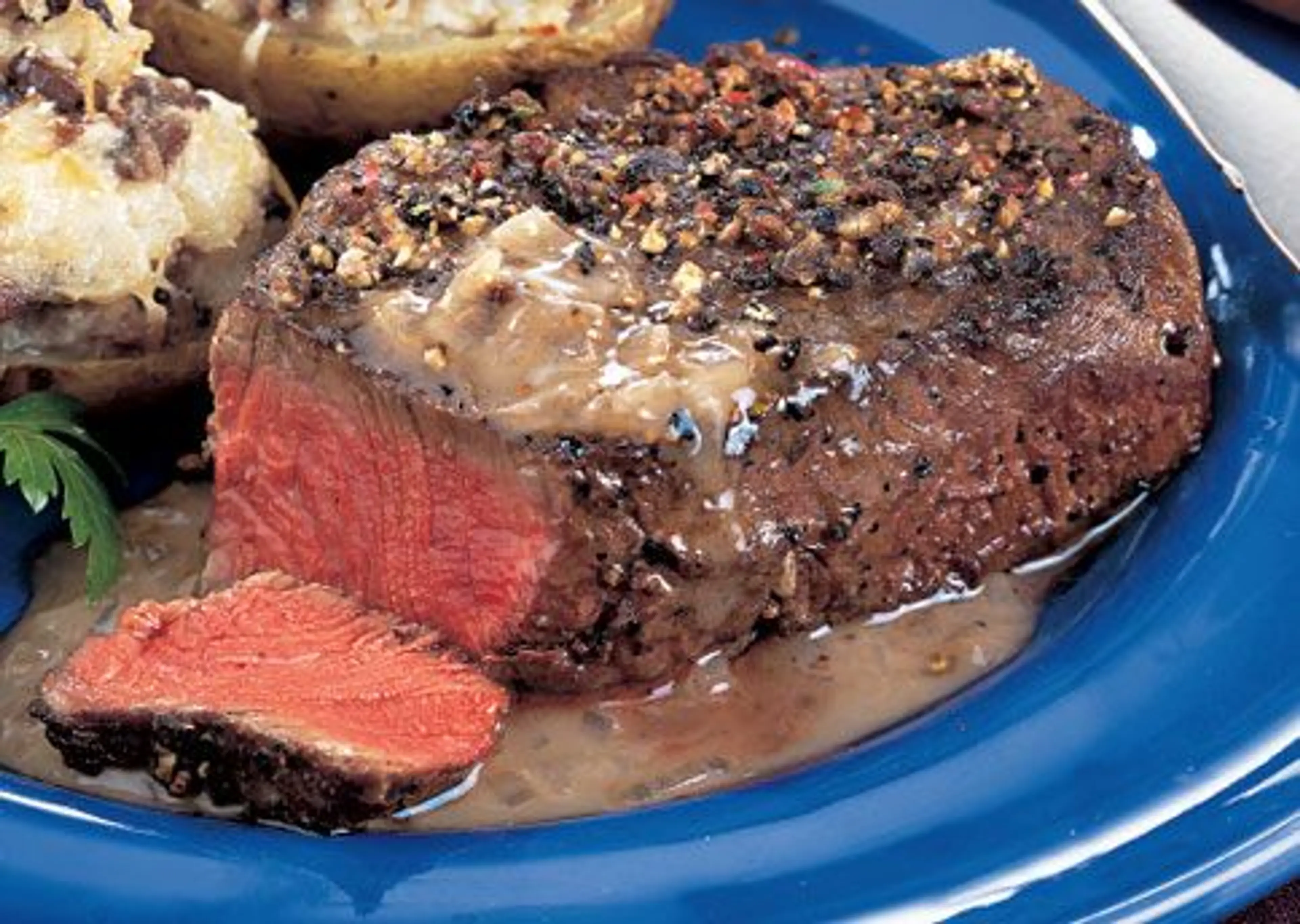 Peppercorn Steaks with Bourbon Sauce