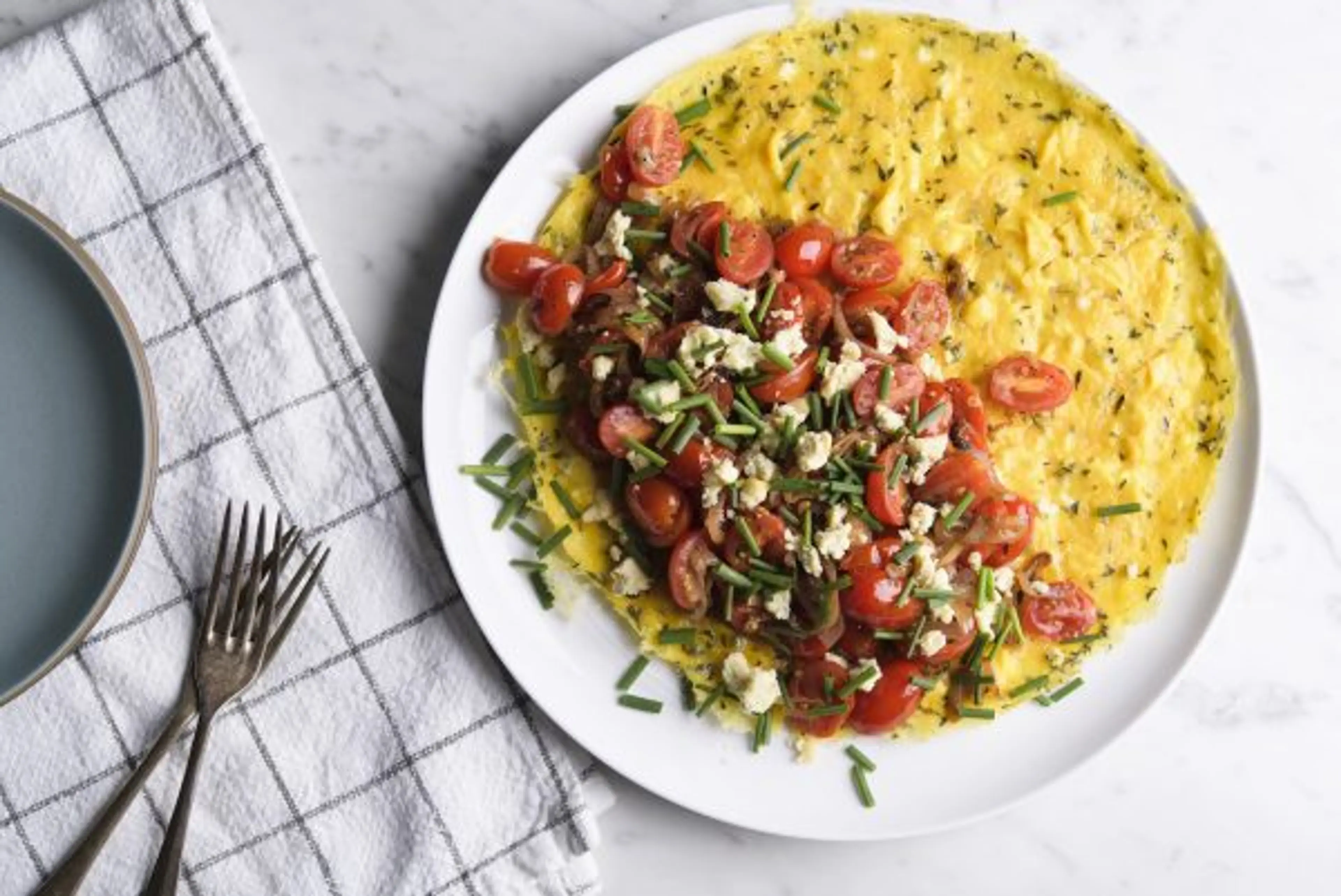 Herbed Omelet with Tomatoes and Blue Cheese