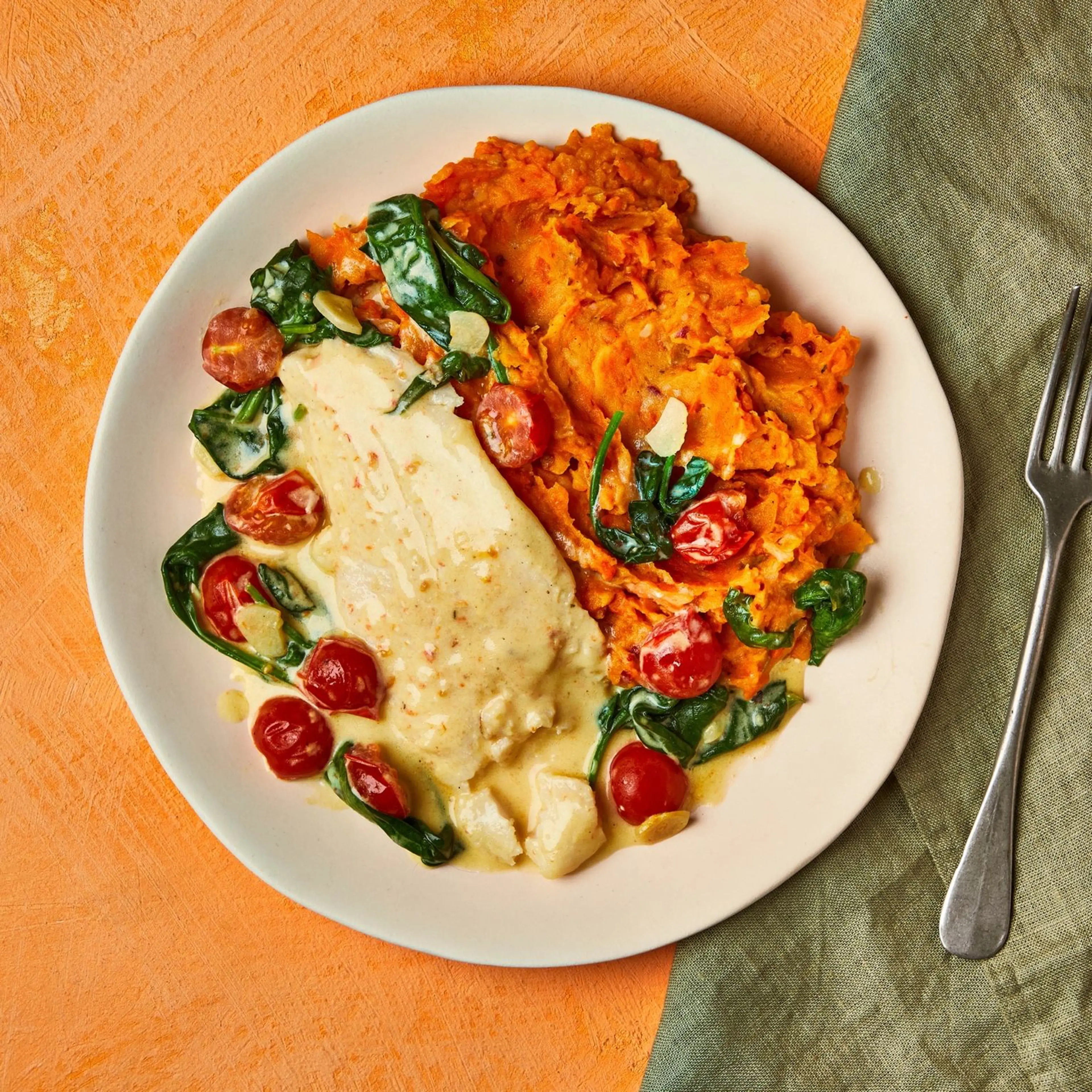 Creamy Basa with tomato sauce & Harissa Mash