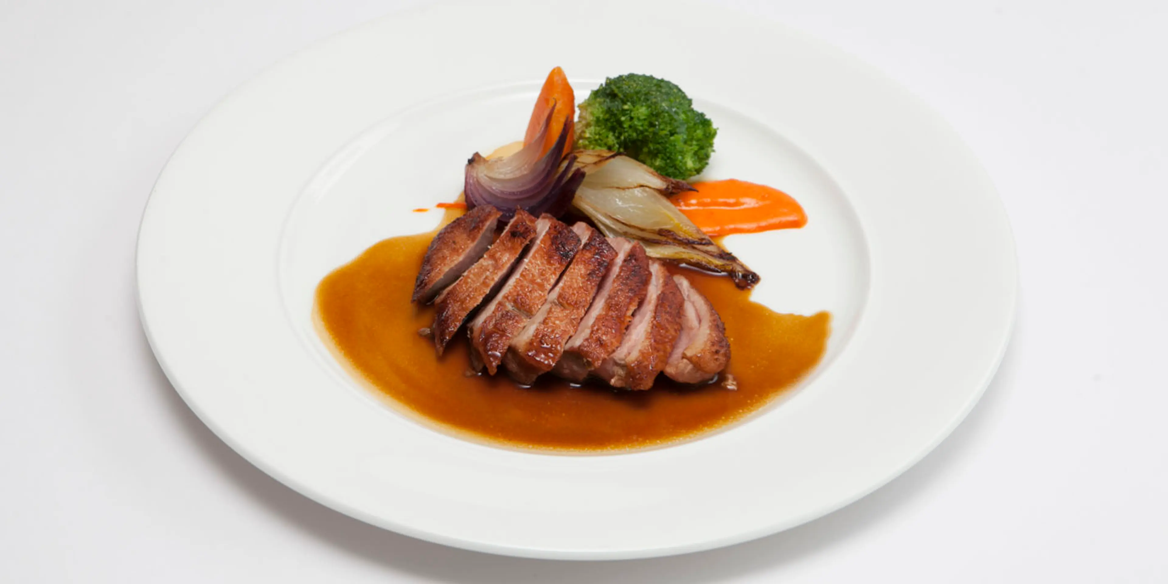 Duck breast with spiced sauce