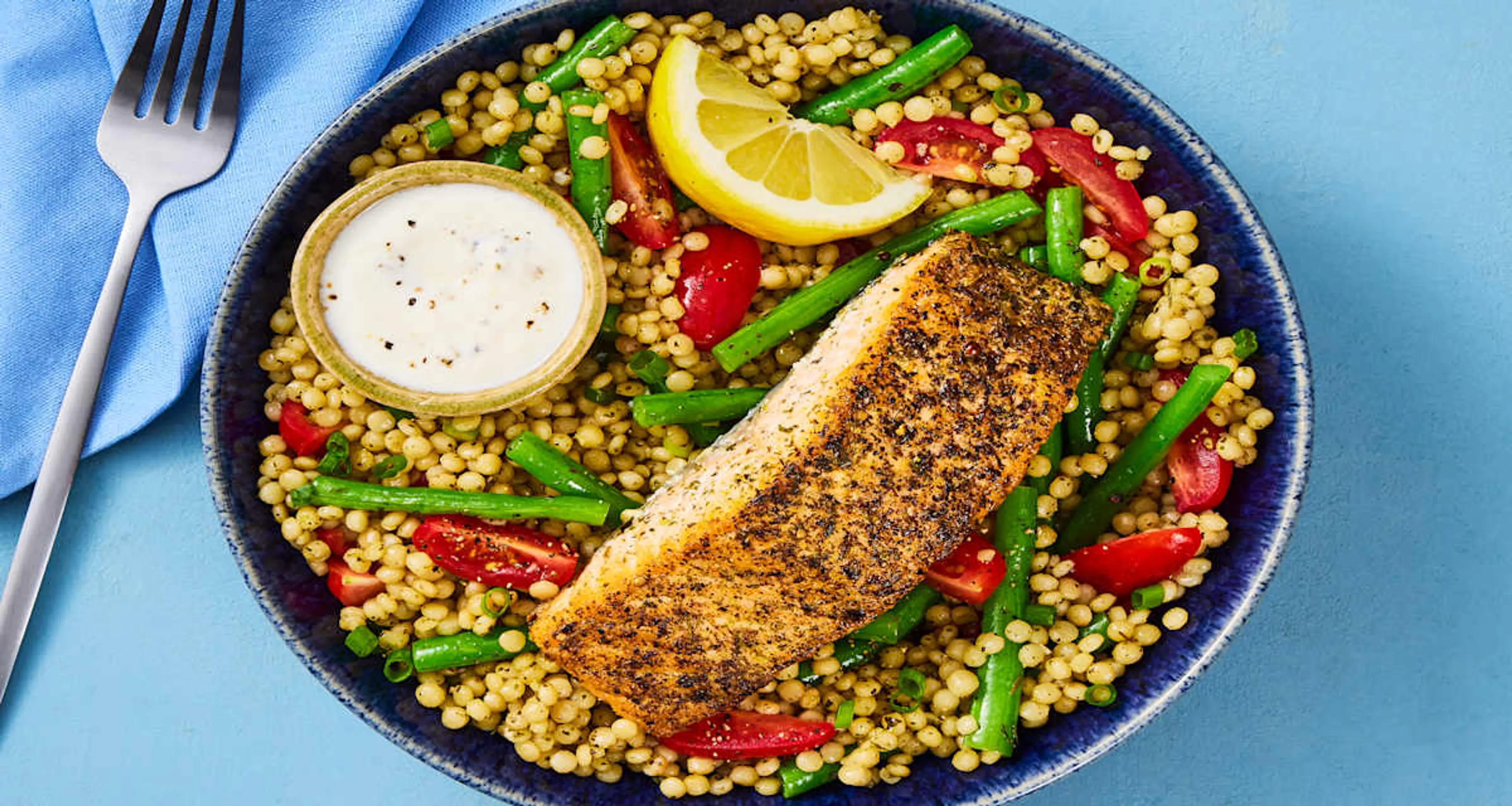 Salmon Limone over Herbed Couscous with Green Beans & Tomato